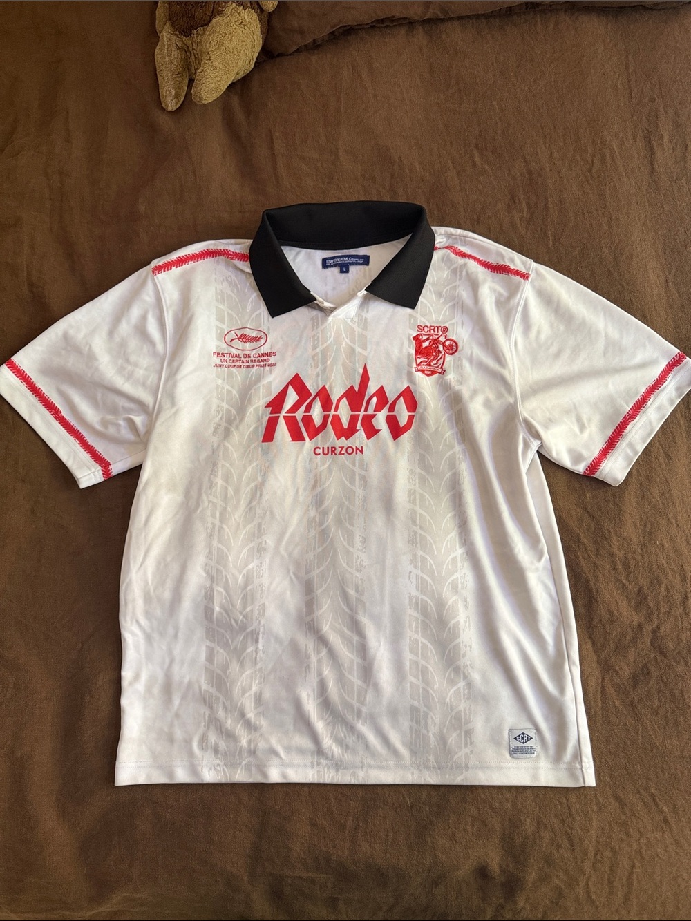 White Polo Jersey with Black Collar and Red Accents